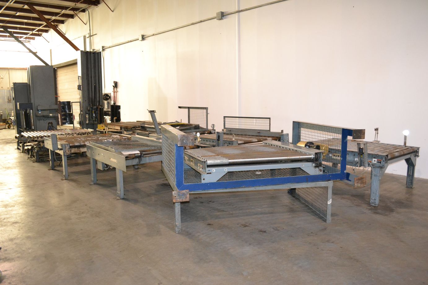 (2) Lantech Shasp Pallet Shrink Wrap Machines with Motorized conveyors (For Parts)