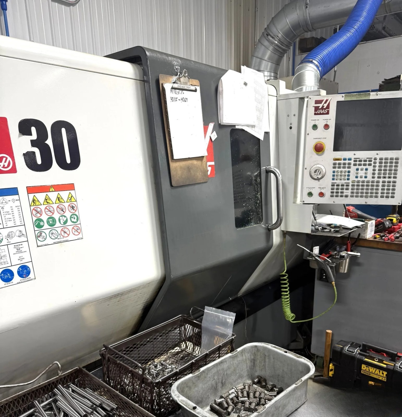 2019 Haas ST-30 CNC lathe with NextGen control and parts baskets in front