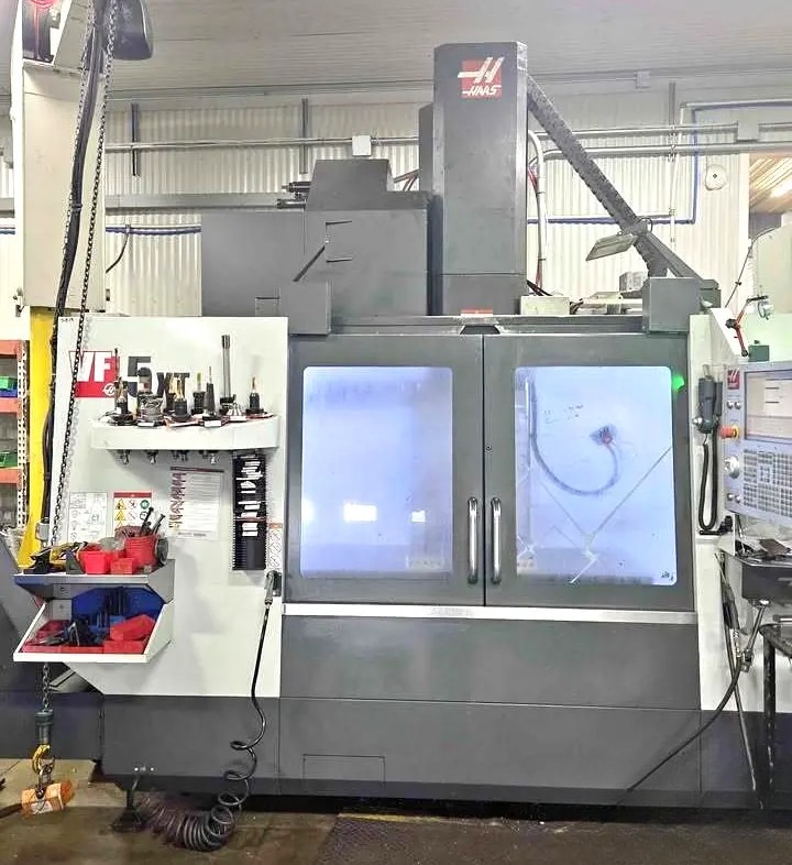 2019 Haas VF-5/50XT vertical machining center under power at The Equipment Hub, doors closed, control lit