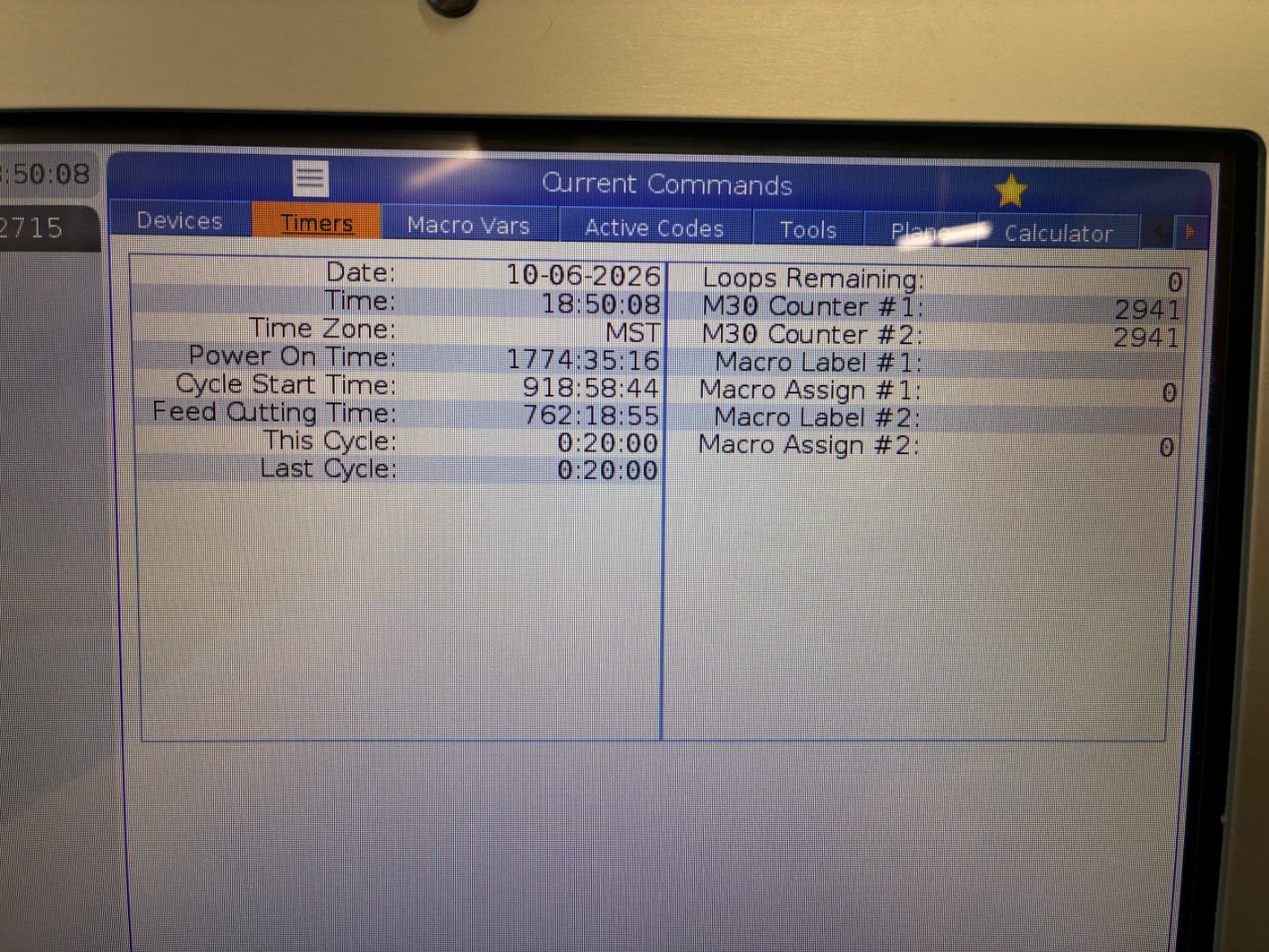 Haas NGC control Current Commands Timers screen showing power on time, cycle start time, and feed cutting time